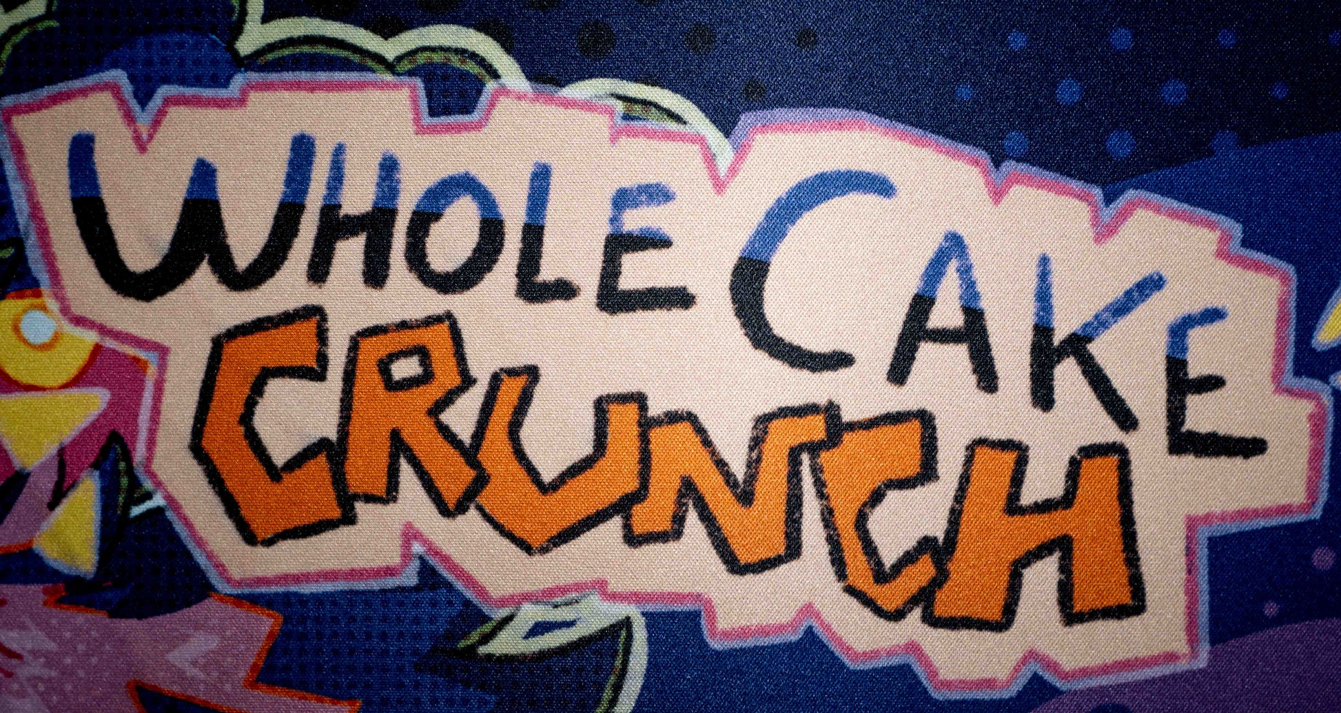 cartoonish text that reads 'Whole Cake Crunch'
